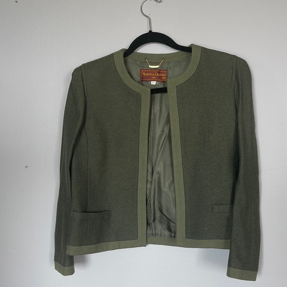 A beautiful green wool French jacket size small and gently used.